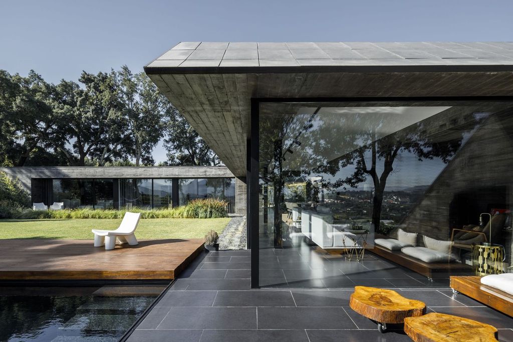 Cork Oak House, An Angular Concrete House by Hugo Pereira Arquitetos