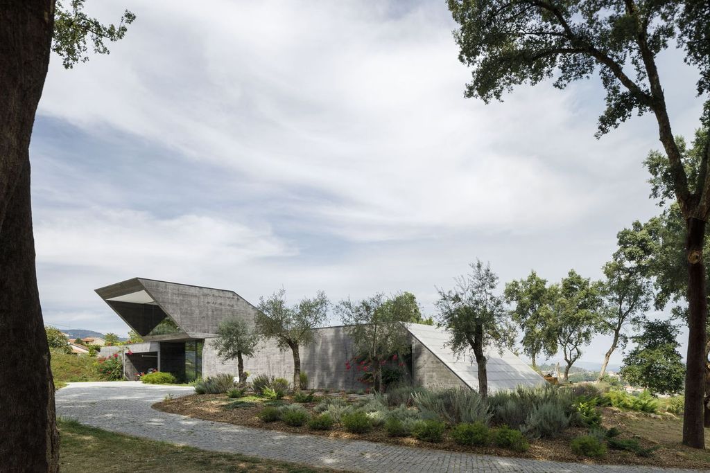 Cork Oak House, An Angular Concrete House by Hugo Pereira Arquitetos