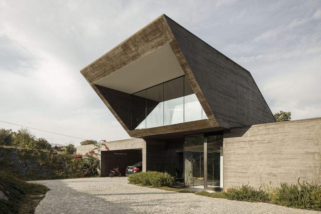 Cork Oak House, An Angular Concrete House by Hugo Pereira Arquitetos