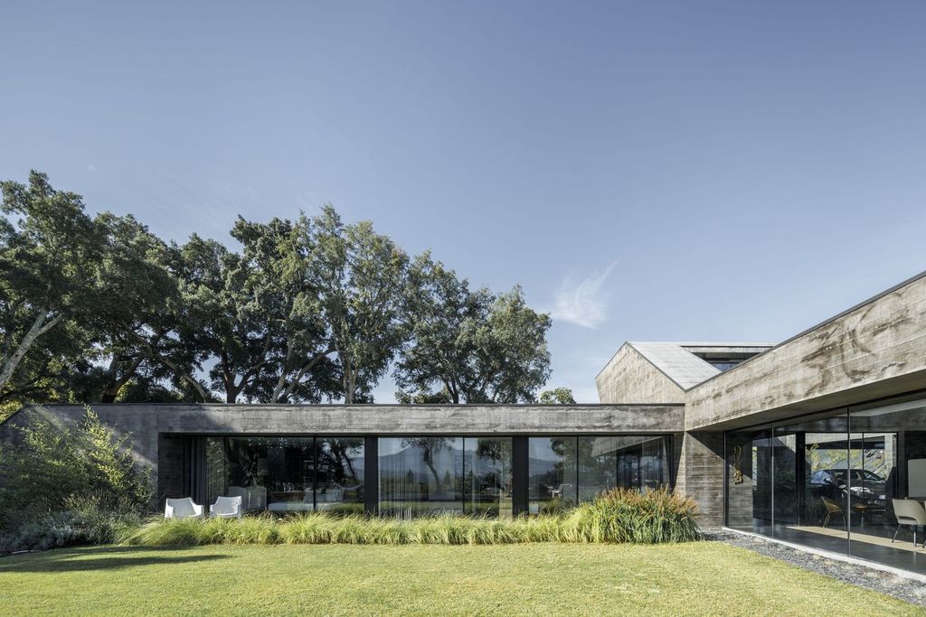 Cork Oak House, An Angular Concrete House by Hugo Pereira Arquitetos