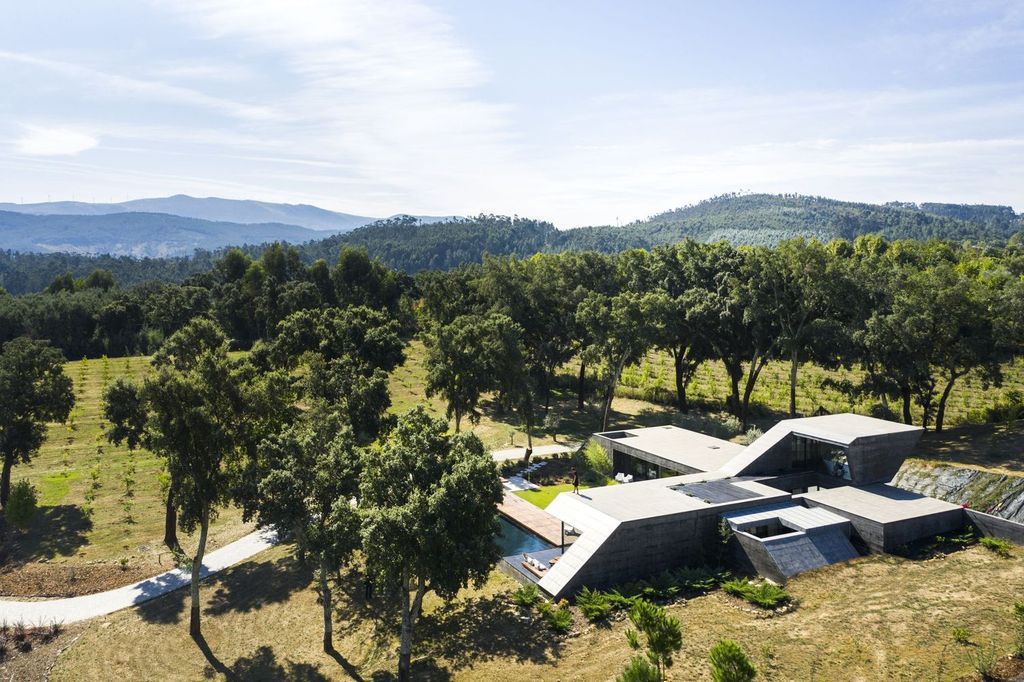 Cork Oak House, An Angular Concrete House by Hugo Pereira Arquitetos