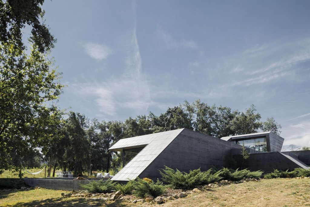 Cork Oak House, An Angular Concrete House by Hugo Pereira Arquitetos