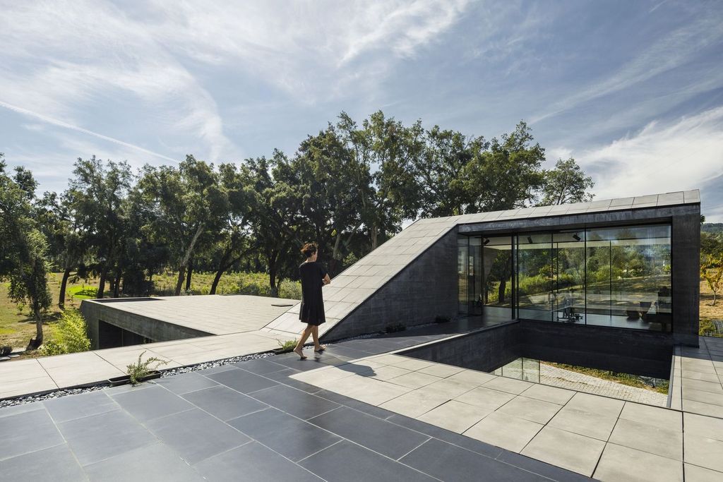 Cork Oak House, An Angular Concrete House by Hugo Pereira Arquitetos