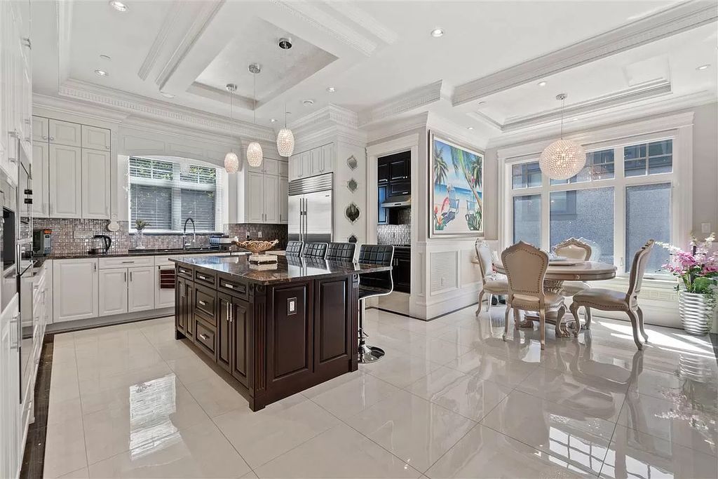 The Royal-style Vista House in Vancouver offers luxurious qualities now available for sale. This home located at 6487 Mccleery St, Vancouver, BC V6N 1G5, Canada