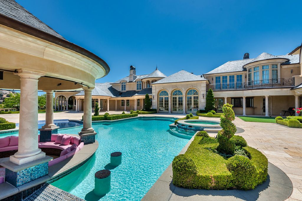 The French Normandy Mansion in Hidden Hills is a grand estate spans approximately 21,000 square feet of spectacular living space now available for sale. This home located at 25220 Walker Rd, Hidden Hills, California