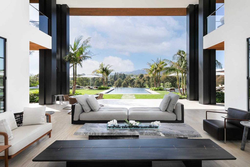 The Contemporary Mansion in Santa Monica is an extraordinary estate with  magnificent fairway and mountain views and exceptional amenities now available for sale. This home located at 1525 San Vicente Blvd, Santa Monica, California