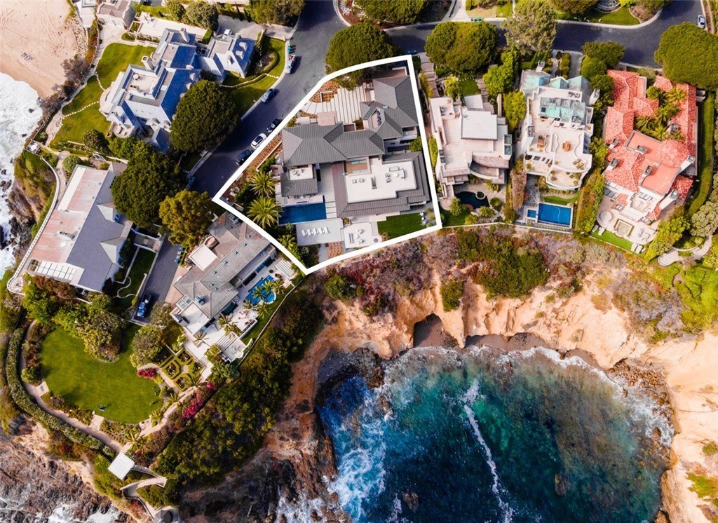 The Mansion in Laguna Beach is a newly reimagined and reconstructed Legacy estate with unparalleled views of the Pacific Ocean’s sparkling waters now available for sale. This home located at 33 Smithcliffs Rd, Laguna Beach, California;