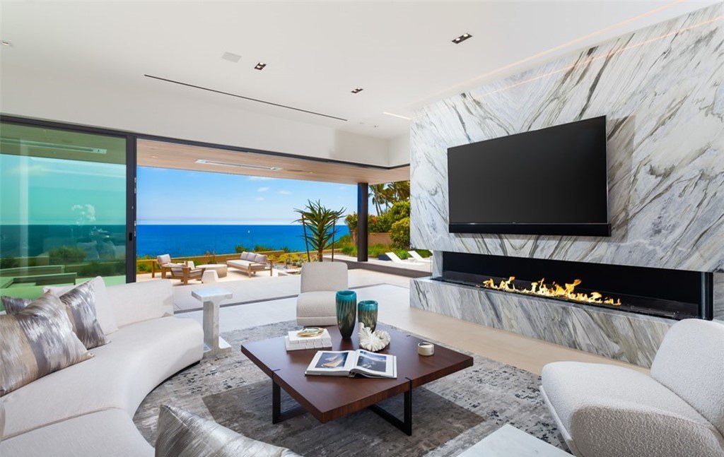 The Mansion in Laguna Beach is a newly reimagined and reconstructed Legacy estate with unparalleled views of the Pacific Ocean’s sparkling waters now available for sale. This home located at 33 Smithcliffs Rd, Laguna Beach, California;