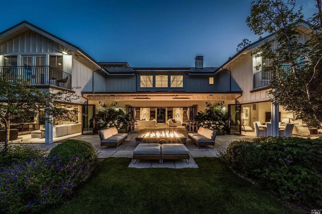 The Home in Napa is a quintessential estate located on a quiet country lane in Yountville and surrounded by vineyards now available for sale. This home located at 1124 State Ln, Yountville, California