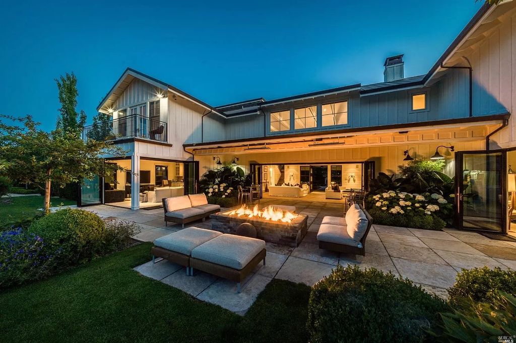 The Home in Napa is a quintessential estate located on a quiet country lane in Yountville and surrounded by vineyards now available for sale. This home located at 1124 State Ln, Yountville, California