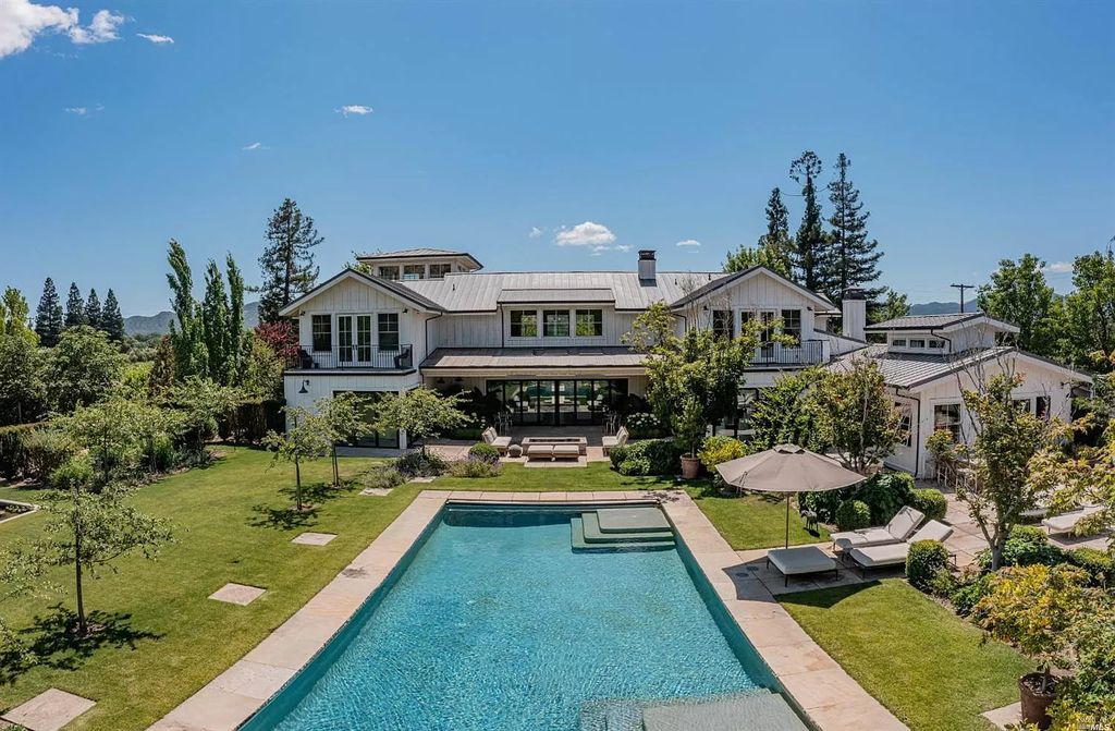 The Home in Napa is a quintessential estate located on a quiet country lane in Yountville and surrounded by vineyards now available for sale. This home located at 1124 State Ln, Yountville, California