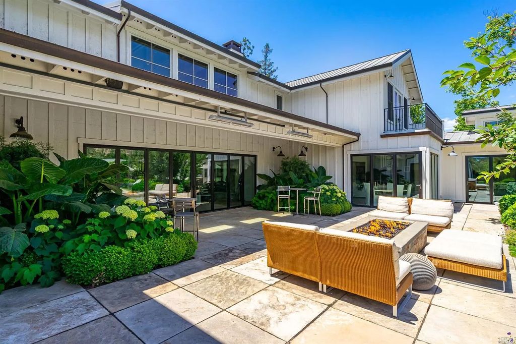 The Home in Napa is a quintessential estate located on a quiet country lane in Yountville and surrounded by vineyards now available for sale. This home located at 1124 State Ln, Yountville, California