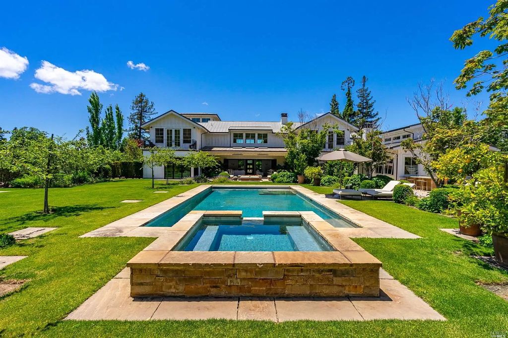 The Home in Napa is a quintessential estate located on a quiet country lane in Yountville and surrounded by vineyards now available for sale. This home located at 1124 State Ln, Yountville, California