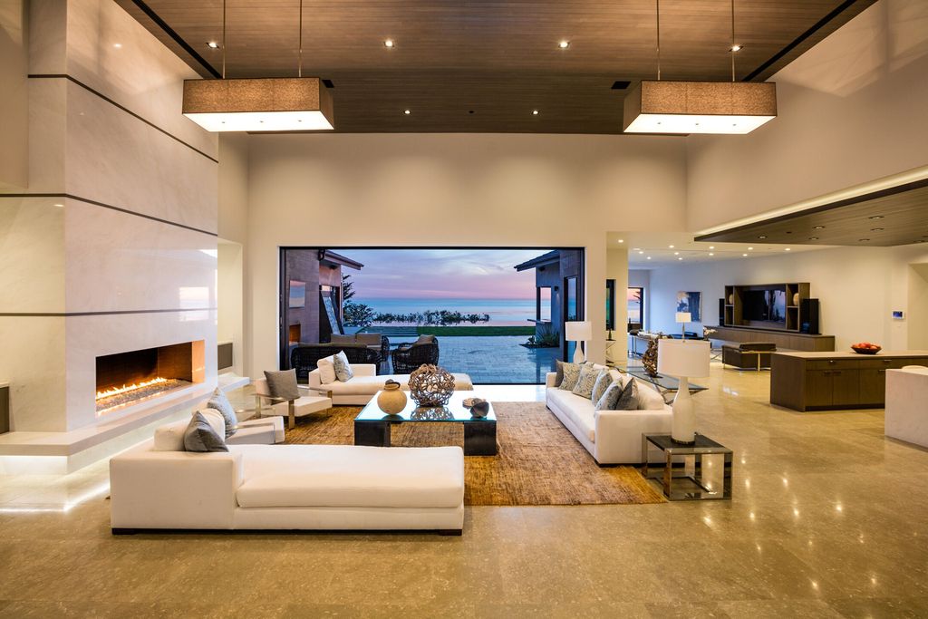 The Villa in Malibu is a sexy single-story has soaring ceilings, French oak wood and sea stone floors, and stone, wood finishes now available for sale. This home located at 11902 Ellice St, Malibu, California