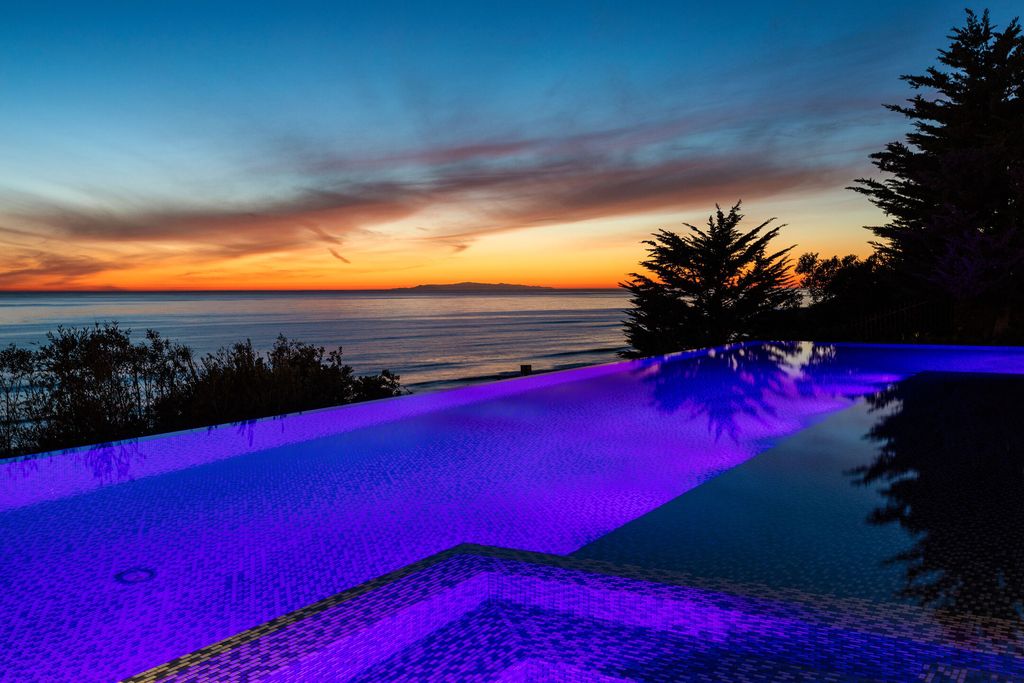 The Villa in Malibu is a sexy single-story has soaring ceilings, French oak wood and sea stone floors, and stone, wood finishes now available for sale. This home located at 11902 Ellice St, Malibu, California