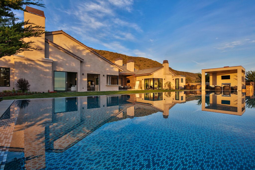 The Villa in Malibu is a sexy single-story has soaring ceilings, French oak wood and sea stone floors, and stone, wood finishes now available for sale. This home located at 11902 Ellice St, Malibu, California