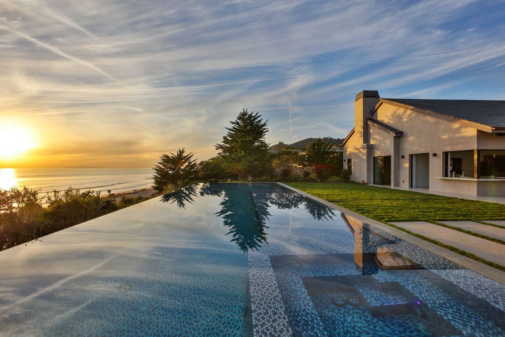 The Villa in Malibu is a sexy single-story has soaring ceilings, French oak wood and sea stone floors, and stone, wood finishes now available for sale. This home located at 11902 Ellice St, Malibu, California