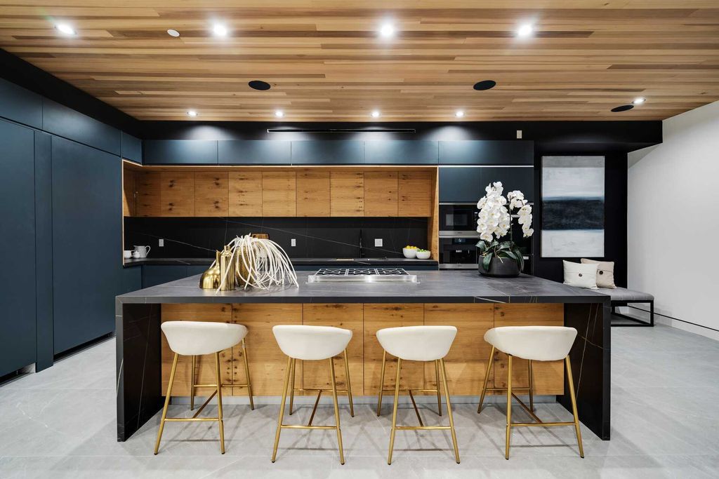 The Los Angeles Home is a gated property in the heart of Melrose Village showcases exquisite contemporary design now available for sale. This home located at 810 N Spaulding Ave, Los Angeles, California