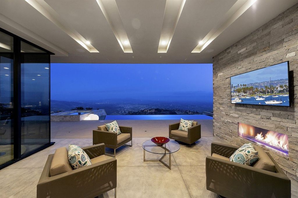 The Home in Rancho Santa Fe is a custom-built, two-story residence in the coveted Cielo community features breathtaking views now available for sale. This home located at 7923 Camino De Arriba, Rancho Santa Fe, California