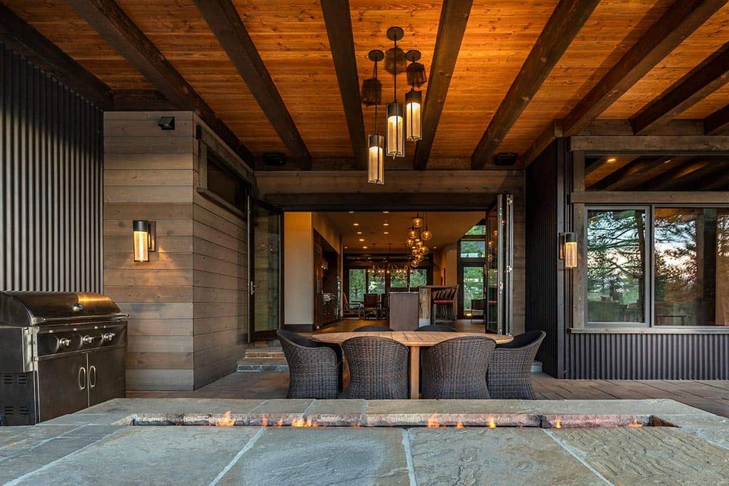 The Martis Camp Home is an attractive retreat with views of Lookout Mountain and has large outdoor patio off the great room with firepit now available for sale. This home located at 9625 Dunsmuir Way, Truckee, California