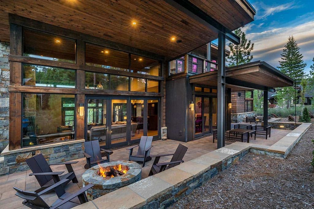 The Martis Camp Home is an attractive retreat with views of Lookout Mountain and has large outdoor patio off the great room with firepit now available for sale. This home located at 9625 Dunsmuir Way, Truckee, California