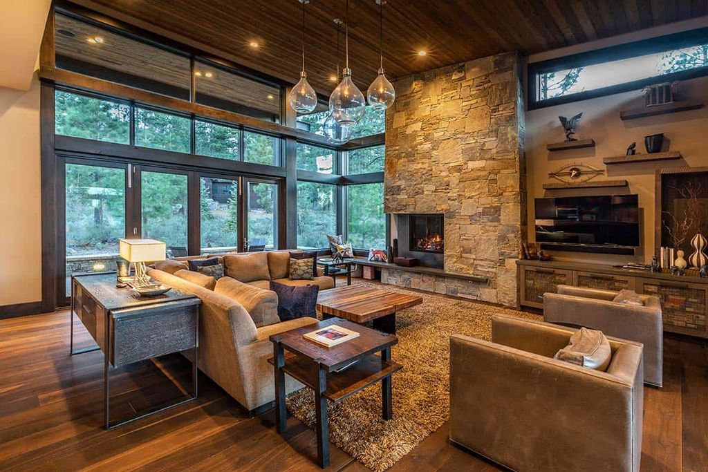 The Martis Camp Home is an attractive retreat with views of Lookout Mountain and has large outdoor patio off the great room with firepit now available for sale. This home located at 9625 Dunsmuir Way, Truckee, California