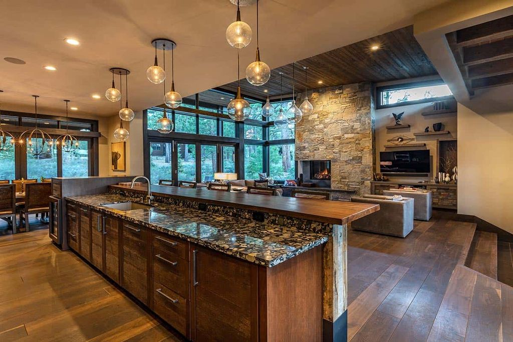 To add a bit of glam to your drab kitchen, include metallic accessories. Consider pendant lights made of copper, bronze fixtures, or stainless steel appliances. These gleaming elements will reflect light and offer an interesting contrast with the gloomy color scheme.