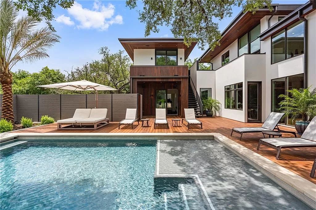 The Austin Home is a contemporary masterpiece in Travis Heights with Lush landscaping and unparalleled privacy now available for sale. This home located at 1015 Bonham Ter, Austin, Texas