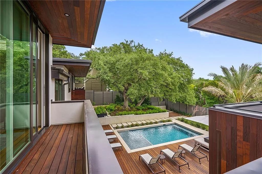 The Austin Home is a contemporary masterpiece in Travis Heights with Lush landscaping and unparalleled privacy now available for sale. This home located at 1015 Bonham Ter, Austin, Texas