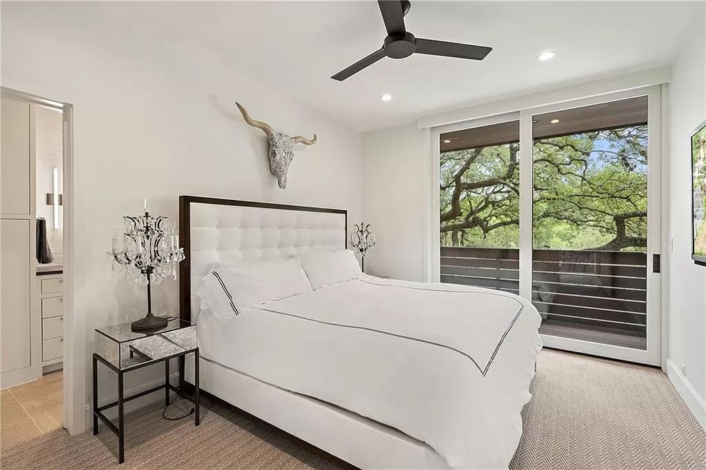 The Austin Home is a contemporary masterpiece in Travis Heights with Lush landscaping and unparalleled privacy now available for sale. This home located at 1015 Bonham Ter, Austin, Texas