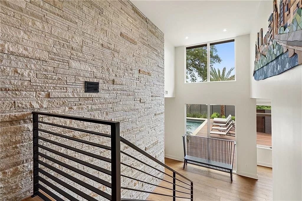 The Austin Home is a contemporary masterpiece in Travis Heights with Lush landscaping and unparalleled privacy now available for sale. This home located at 1015 Bonham Ter, Austin, Texas