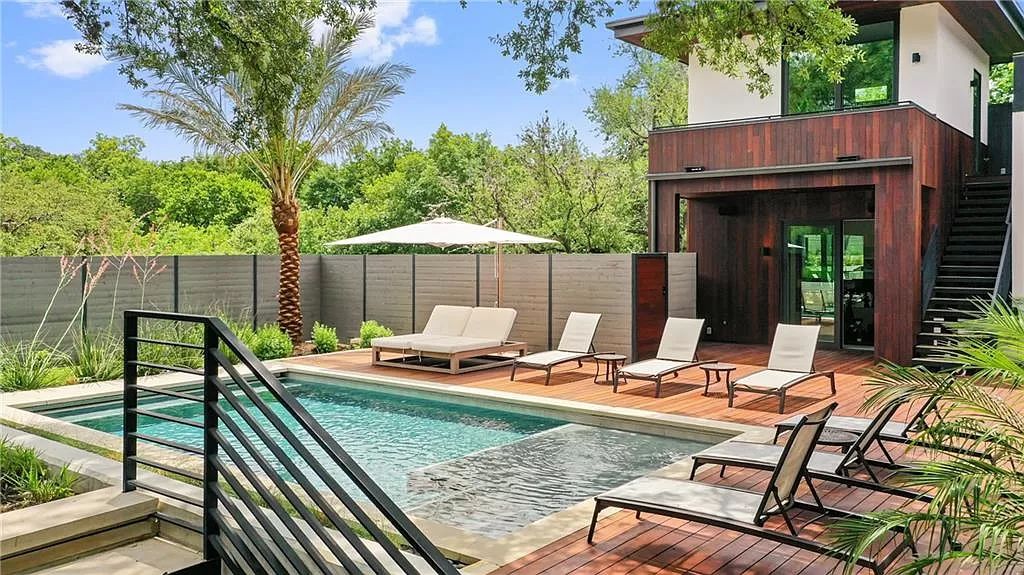 The Austin Home is a contemporary masterpiece in Travis Heights with Lush landscaping and unparalleled privacy now available for sale. This home located at 1015 Bonham Ter, Austin, Texas