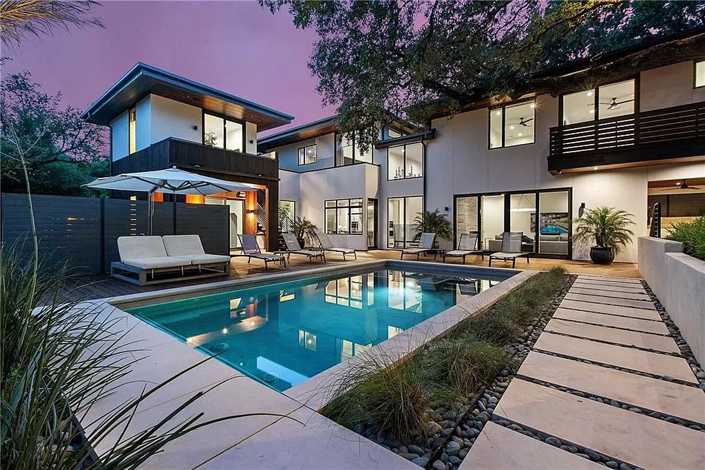 The Austin Home is a contemporary masterpiece in Travis Heights with Lush landscaping and unparalleled privacy now available for sale. This home located at 1015 Bonham Ter, Austin, Texas