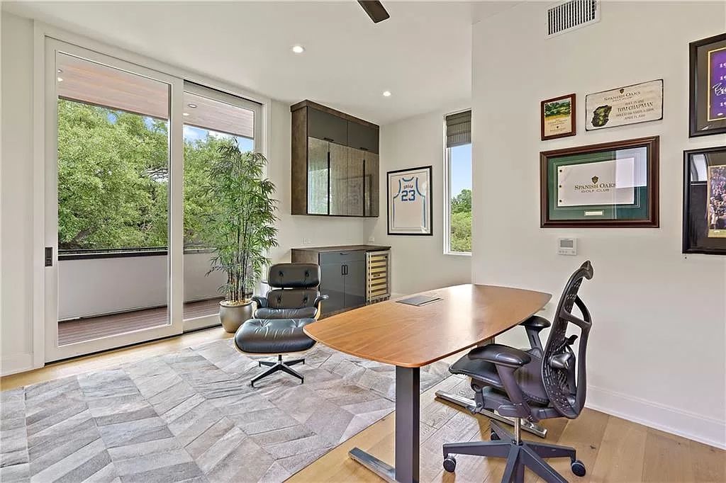 The Austin Home is a contemporary masterpiece in Travis Heights with Lush landscaping and unparalleled privacy now available for sale. This home located at 1015 Bonham Ter, Austin, Texas