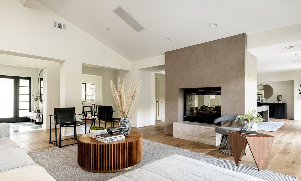 The Contemporary Home in Pacific Palisades is to be captured by the mid-century feeling of the living room that opens up to backyard now available for sale. This home located at 1201 Villa Woods Dr, Pacific Palisades, California