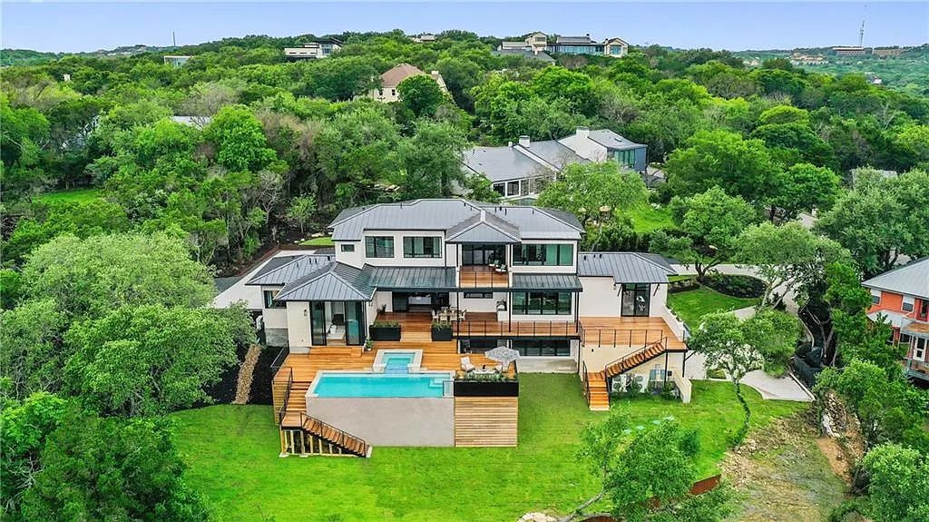 The Austin Home is an undeniably elegant and infinitely liveable estate with panoramic views of downtown Austin now available for sale. This home located at 5 Hillside Ct, Austin, Texas