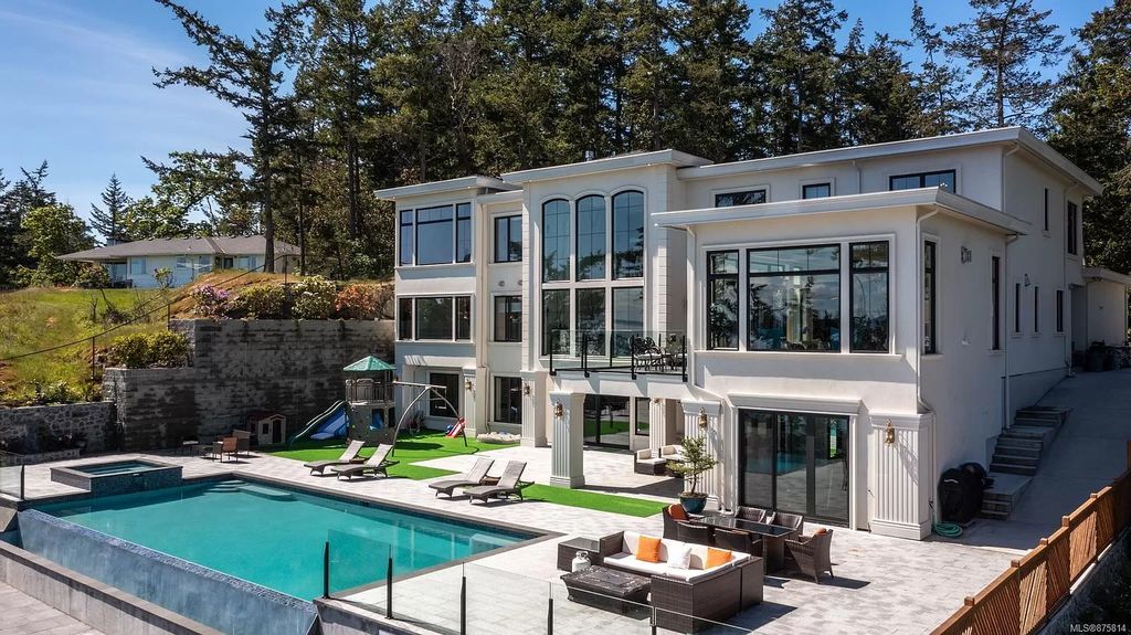 The Waterfront Estate in Saanich offers a sophisticated design now available for sale. This home located at 4823 Major Rd, Saanich, BC V8Y 2L8, Canada