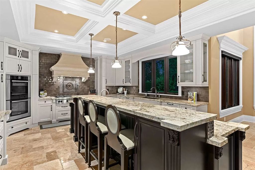 The Timeless European Mansion in Surrey seamlessly combines traditional design with custom interior finishings now available for sale. This home located at 13322 25th Ave, Surrey, BC V4P 1Y6, Canada