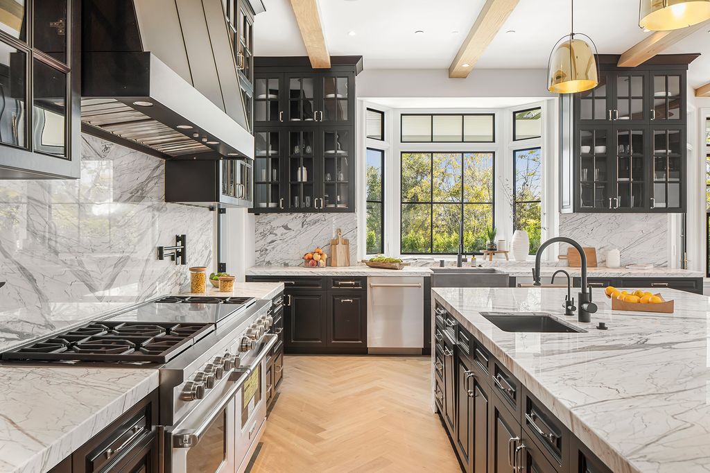 The Mansion in Los Angeles is a new construction dream estate on a long private drive on the most exclusive street in prime Brentwood Park now available for sale. This home located at 22 Oakmont Dr, Los Angeles, California
