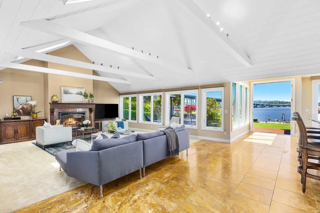 The Waterfront Home in Washington offers shimmering views of the water, city & mountains now available for sale. This home is located at 3261 Evergreen Point Rd, Medina, Washington