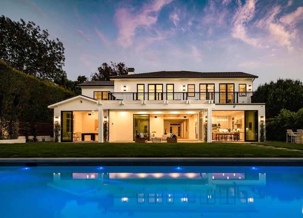 The Brentwood Modern Farmhouse is a stunning newly built property with the finest materials and an amazing backyard oasis now available for sale. This home located at 12825 San Vicente Blvd, Los Angeles, California