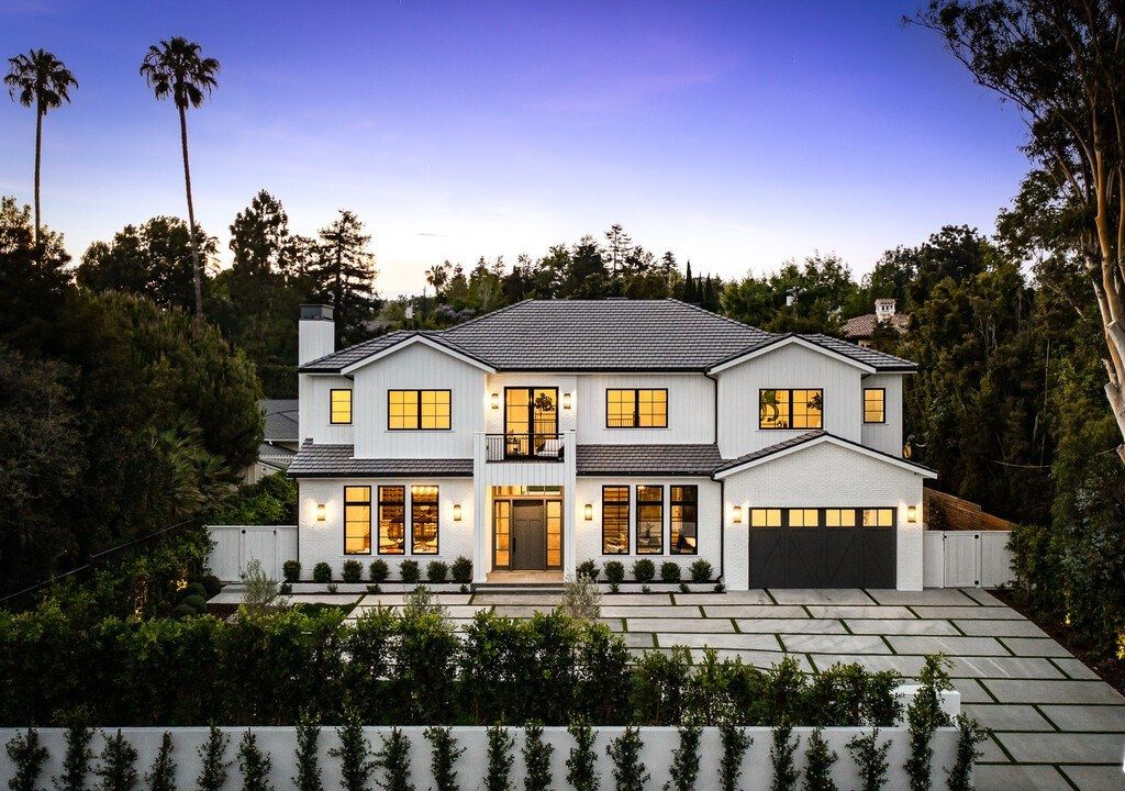 The Brentwood Modern Farmhouse is a stunning newly built property with the finest materials and an amazing backyard oasis now available for sale. This home located at 12825 San Vicente Blvd, Los Angeles, California