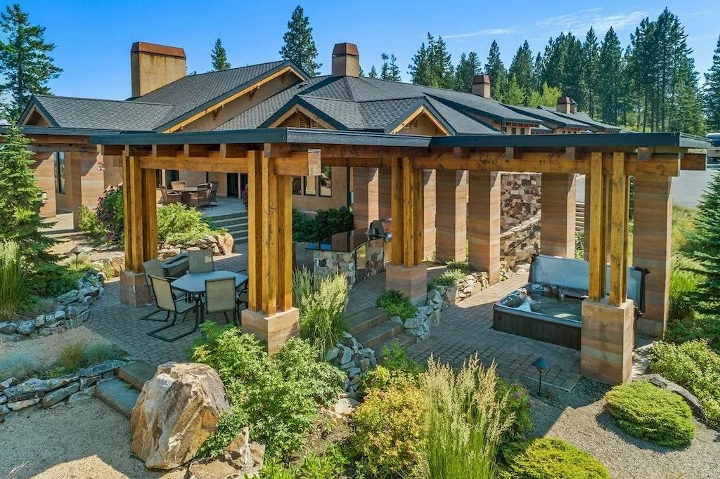 The Lookout Mountain Property is a secluded residence now available for sale. This home is located at 6008 W Lookout Mountain Ln, Spokane, Washington
