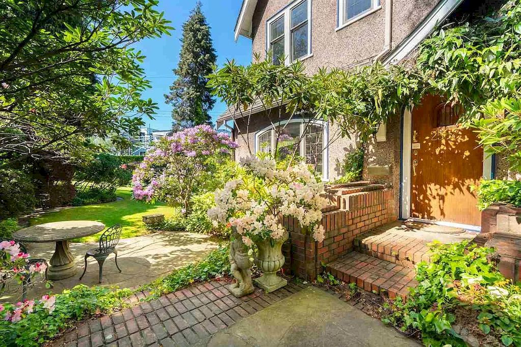 The Lovely House in Vancouver is surrounded by incredible gardens now available for sale. This home is located at 2588 Courtenay St, Vancouver, BC V6R 3X3, Canada