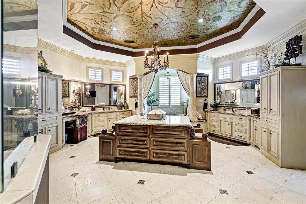 The Texas Home is a magnificent property sitting on a private peninsula lake lot in Katy offers luxurious living now available for sale. This home located at 2607 Morganfair Ln, Katy, Texas