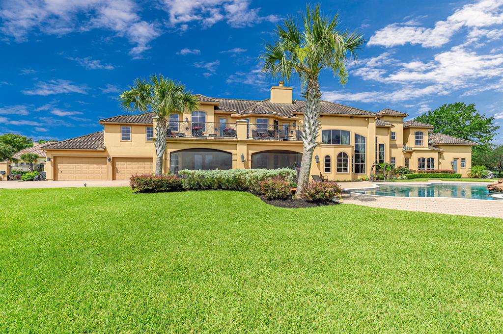 The Texas Home is a magnificent property sitting on a private peninsula lake lot in Katy offers luxurious living now available for sale. This home located at 2607 Morganfair Ln, Katy, Texas