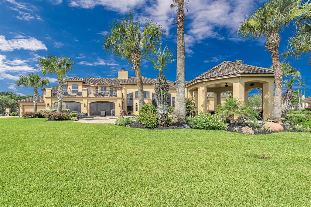 The Texas Home is a magnificent property sitting on a private peninsula lake lot in Katy offers luxurious living now available for sale. This home located at 2607 Morganfair Ln, Katy, Texas