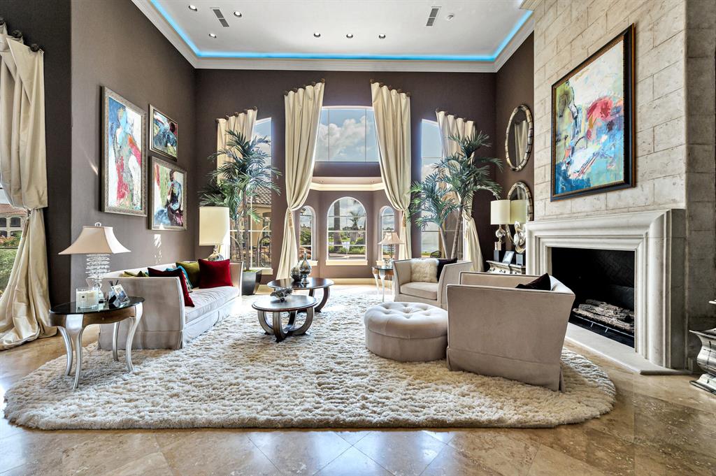 The Texas Home is a magnificent property sitting on a private peninsula lake lot in Katy offers luxurious living now available for sale. This home located at 2607 Morganfair Ln, Katy, Texas