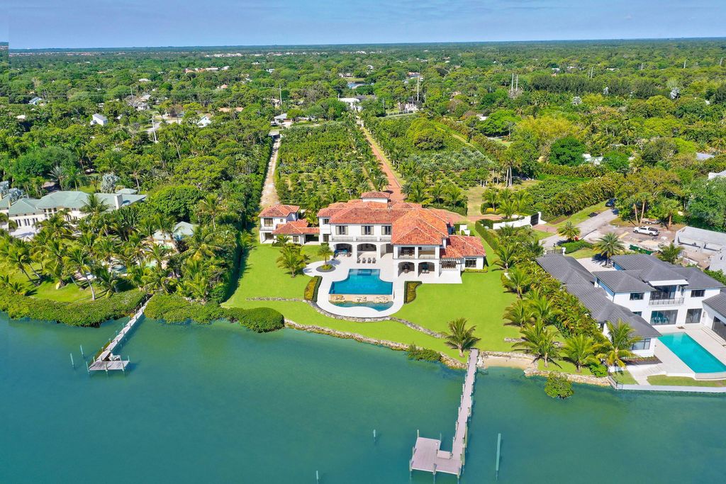 The Florida Mansion is a Moorish-inspired retreat balances intimate spaces and informal flow across 18,000 square feet now available for sale. This home located at 19300 Loxahatchee River Rd, Jupiter, Florida