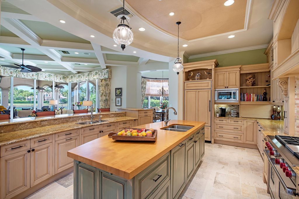 The Home in Naples is a luxurious custom built residence on one of the most sought after streets in Grey Oaks now available for sale. This home located at 2148 Canna Way, Naples, Florida